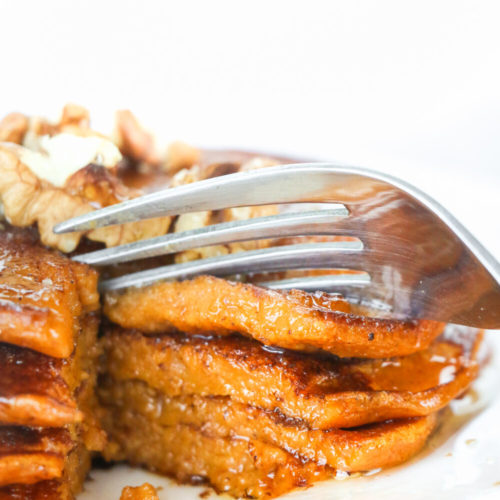 Sweet potato pancakes drizzled with maple syrup