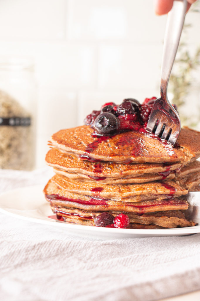 One-bowl banana protein pancakes stacked on top of each other