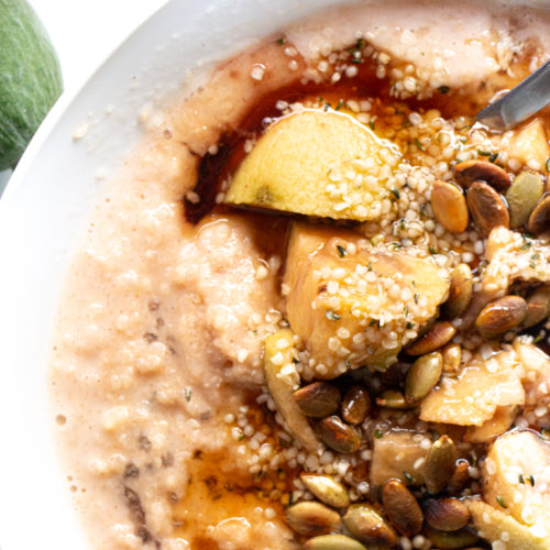 Millet and feijoa porridge with maple syrup, hemp seeds and pumpkin seeds.