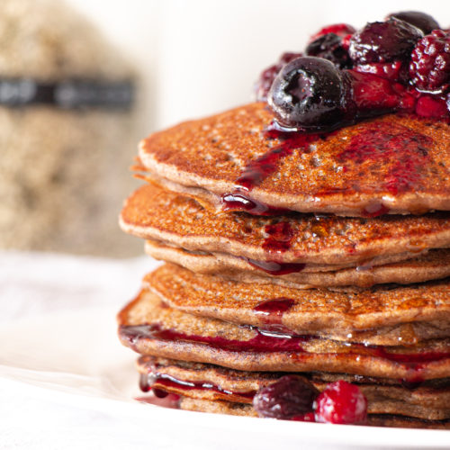 One-bowl banana protein pancakes stacked on top of each other