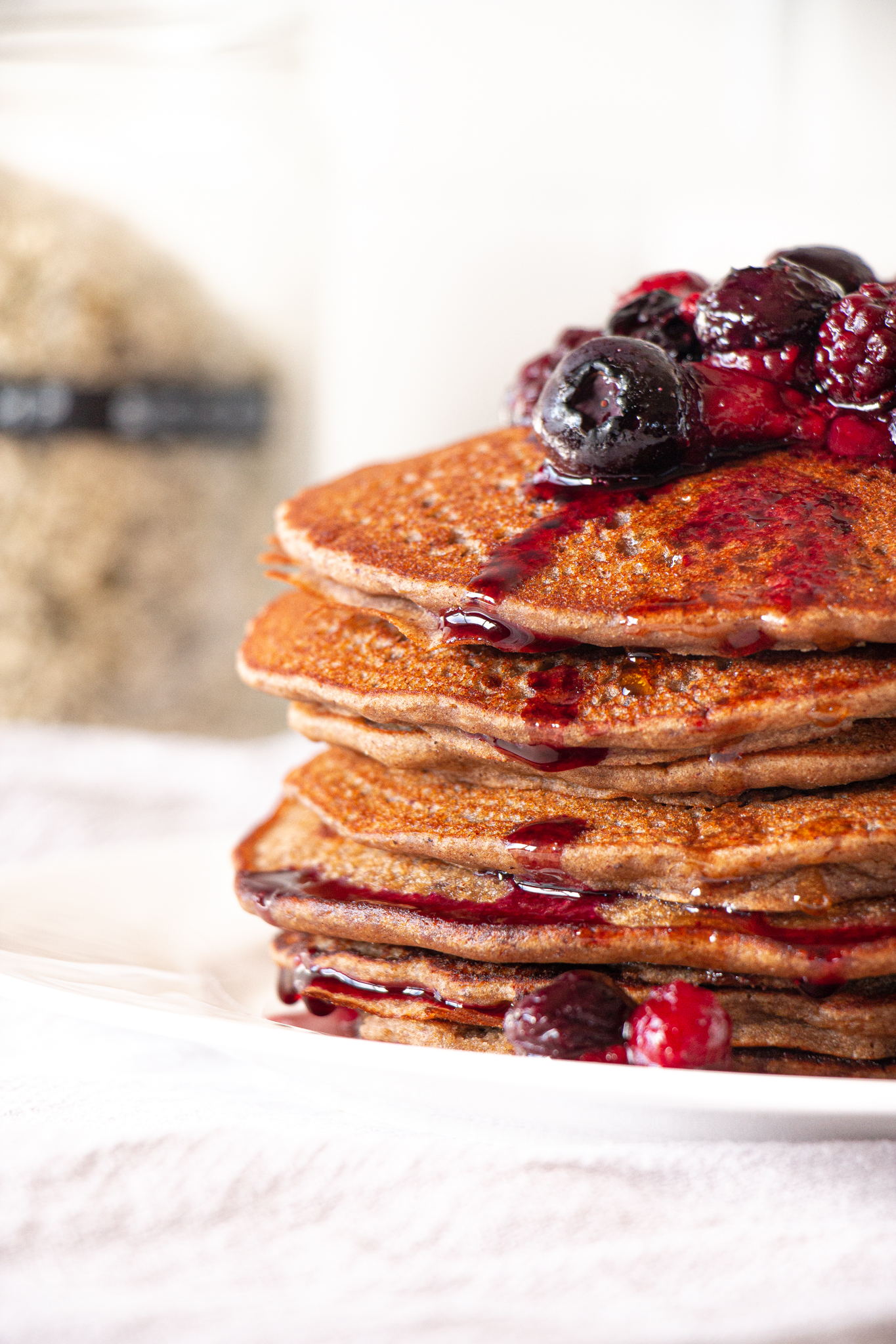 One-bowl banana protein pancakes stacked on top of each other